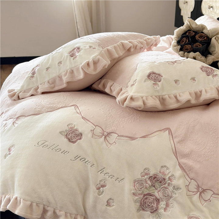 Romantic embroidered bedding set with ruffles and rose motifs