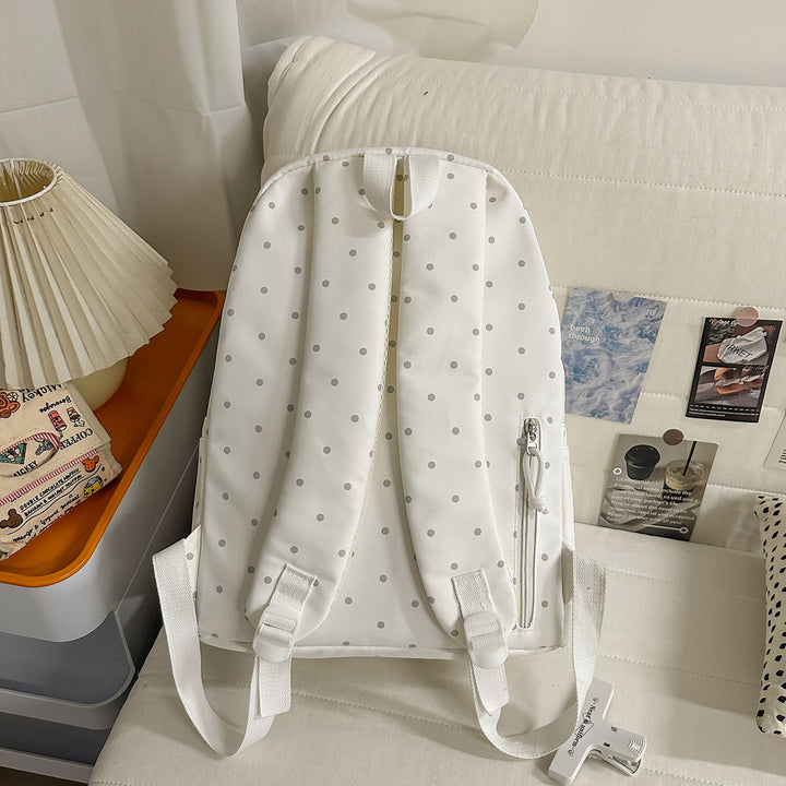Polka Dot Patterned Backpack with Playful Wing Accents Bowlift