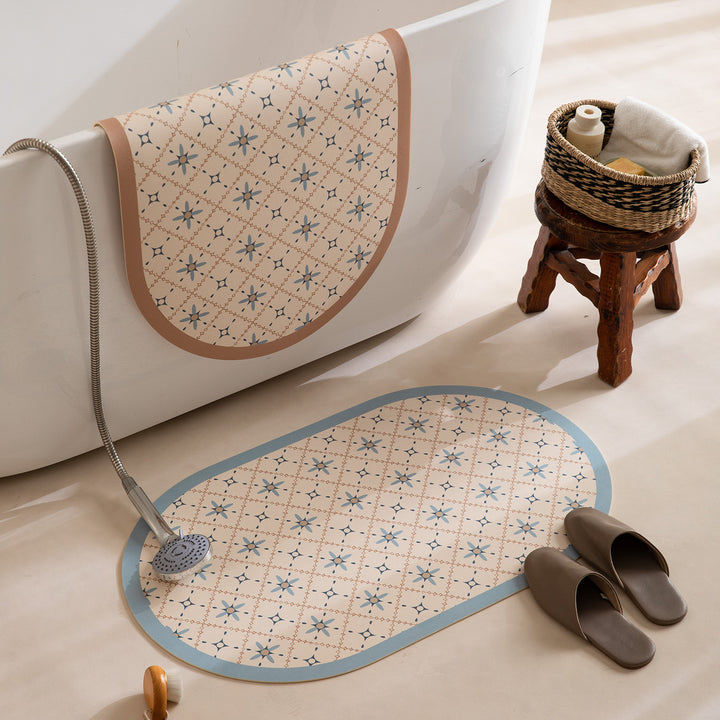 Oval wipeable placemat with embossed tulip pattern and non-slip underside Bowlift