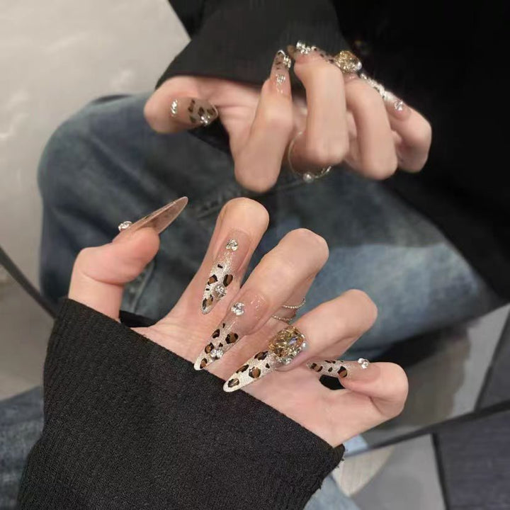 Decorative Stiletto Press-On Nails with Elegant Detailing Bowlift