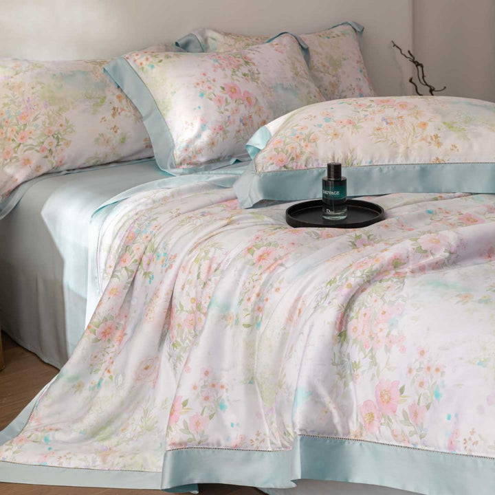 Luxurious cotton satin bedding set with delicate leaf design and hem detail