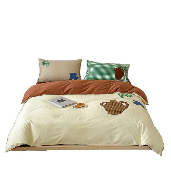 Duvet cover set with applied ceramic and check details, reversible function