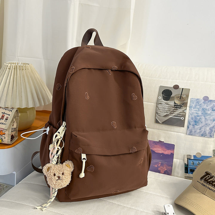 Versatile Casual Backpack with Fun Character Charm Bowlift