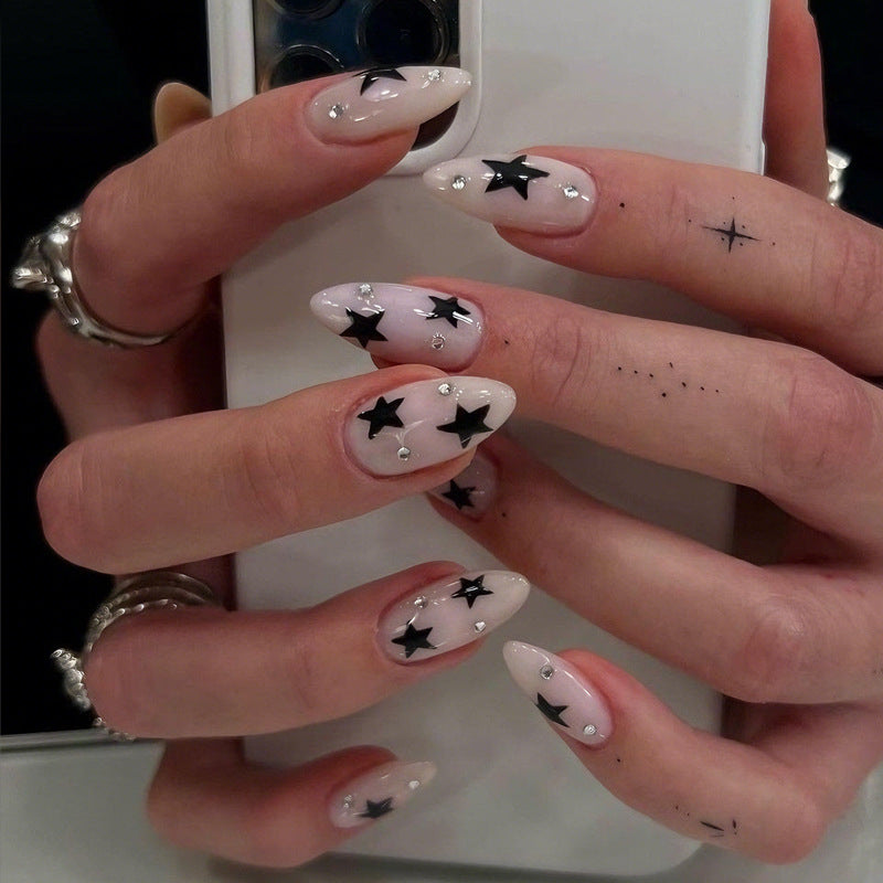 Nail art set with playful star designs Bowlift