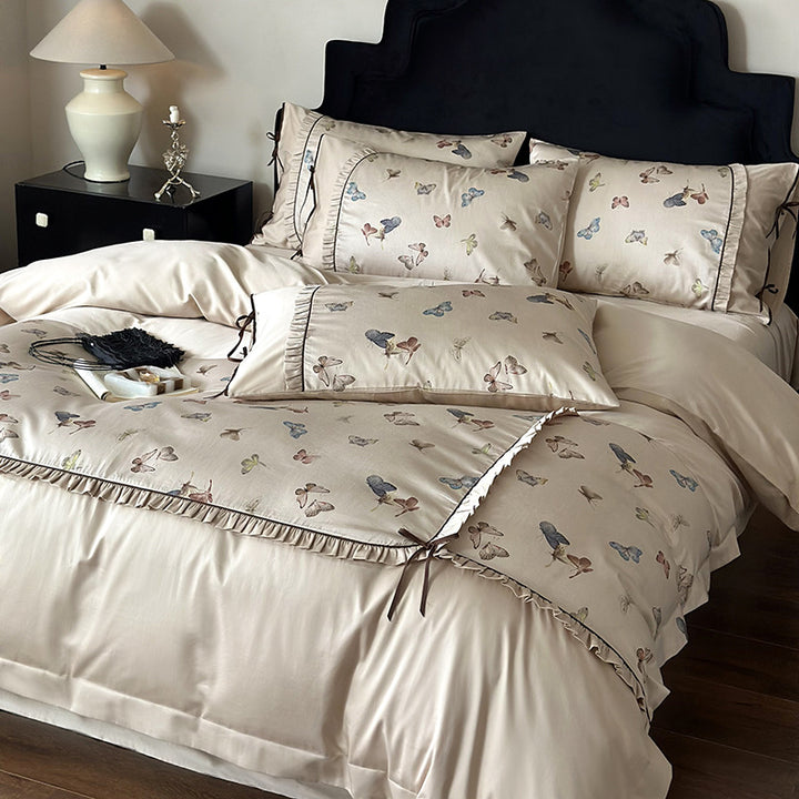 Luxurious satin bedding set with butterfly print and ruffles