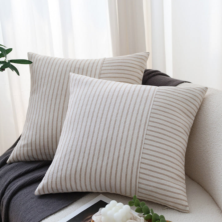 Square decorative pillow cover made of woven stripe pattern with two weaving directions and concealed zipper Bowlift
