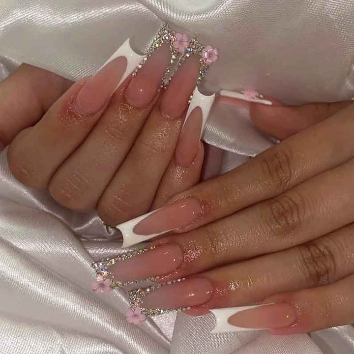Art nail set with elegant glitter and floral accents Bowlift
