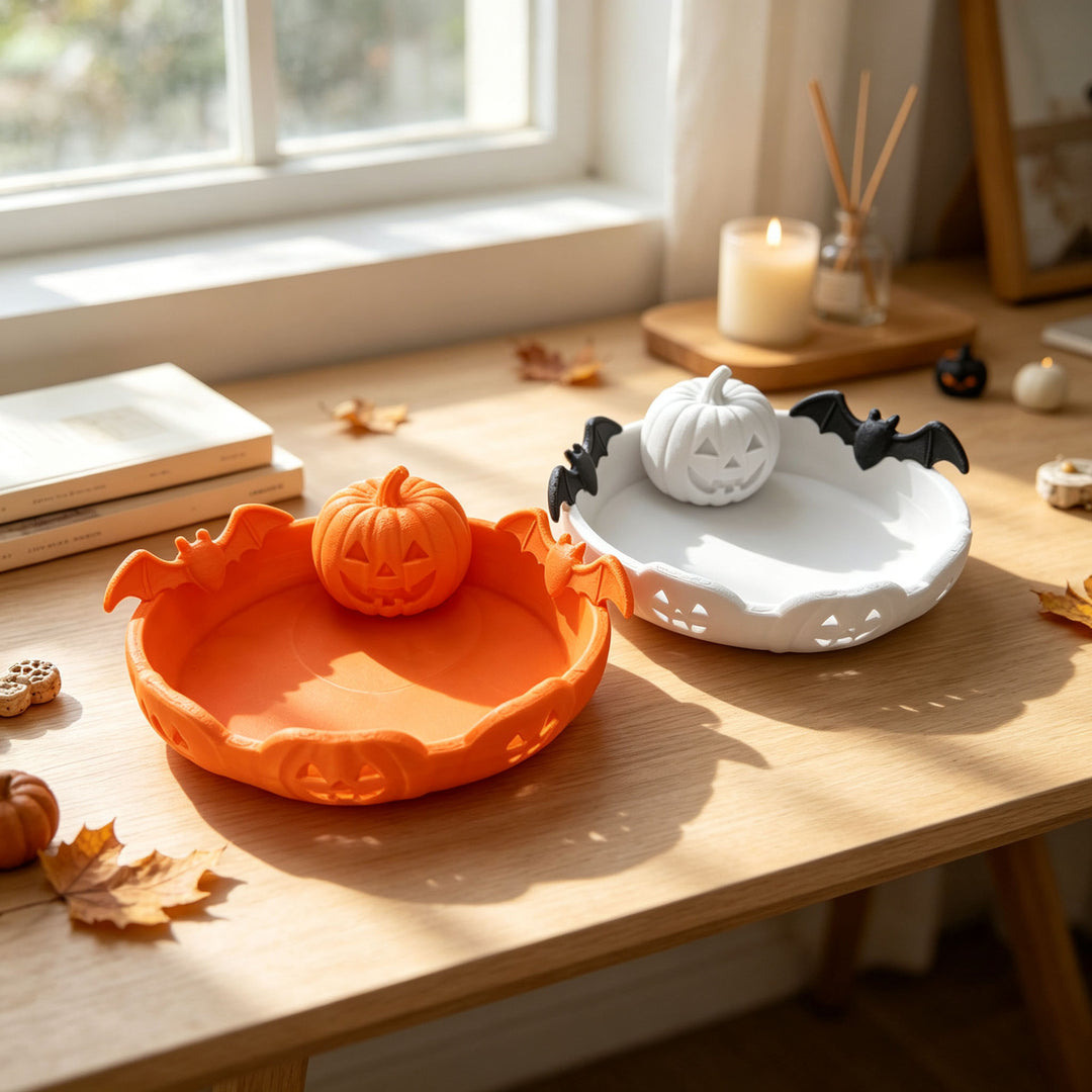 Halloween decorative bowl with carved pumpkin and bat appliqué