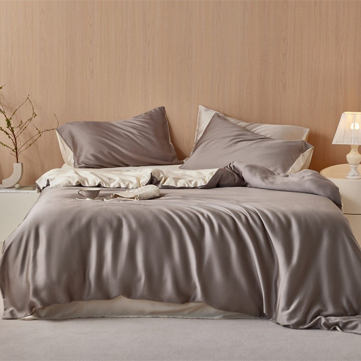 Luxurious cotton satin bedding set with a silky-matte feel, reversible function, and fine piping