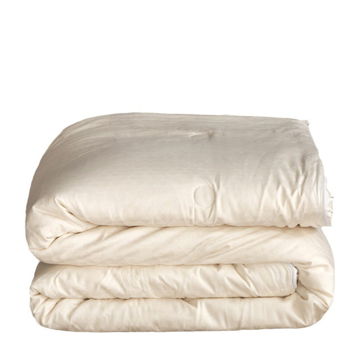 Quilted blanket with jacquard check pattern and floral relief texture