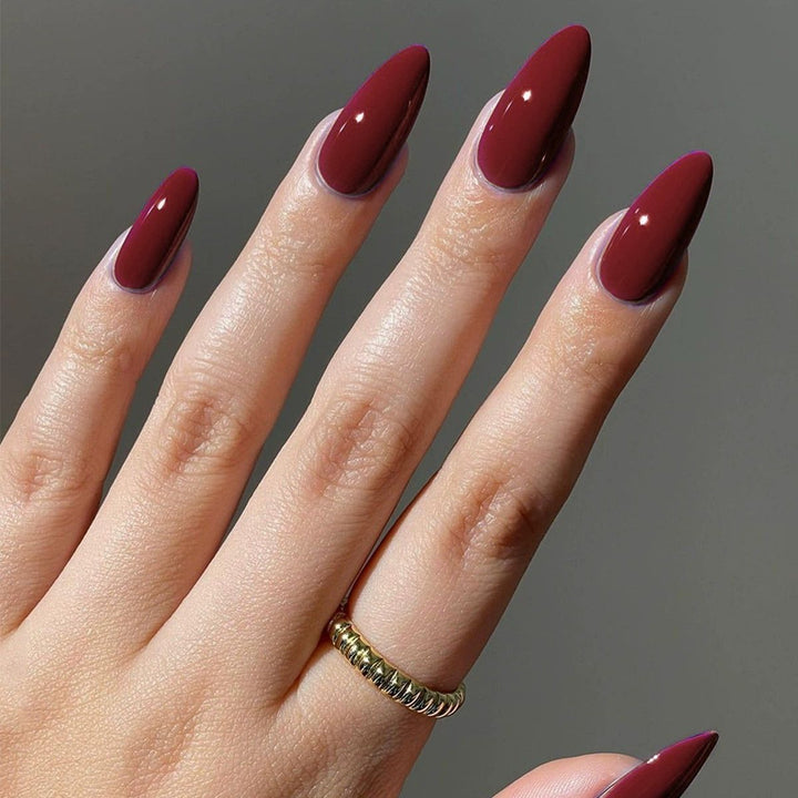High-Gloss Stiletto Nail Enhancements Bowlift