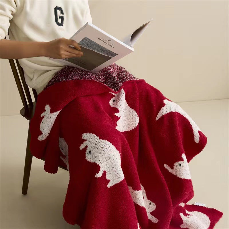 Jacquard knit cuddle blanket with rabbit motifs Bowlift