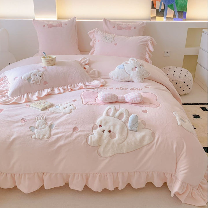 playful bedding set with frills and plush applications