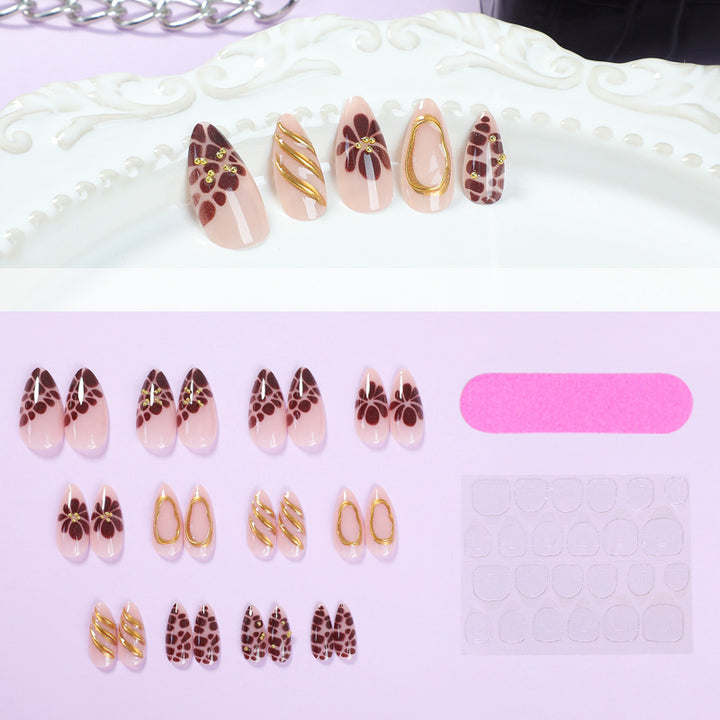 Artificial nail set with elegant flower and gold accents Bowlift
