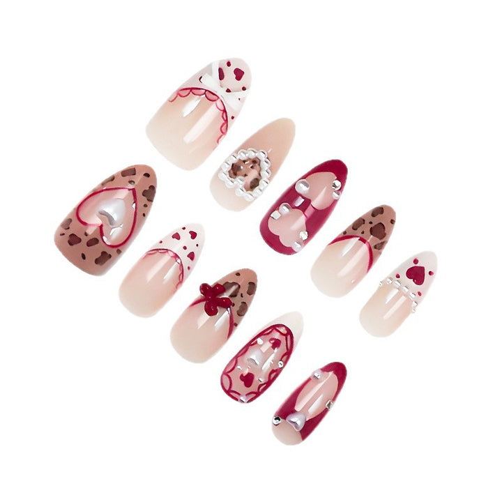 Nail set with romantic heart and bow decorations Bowlift
