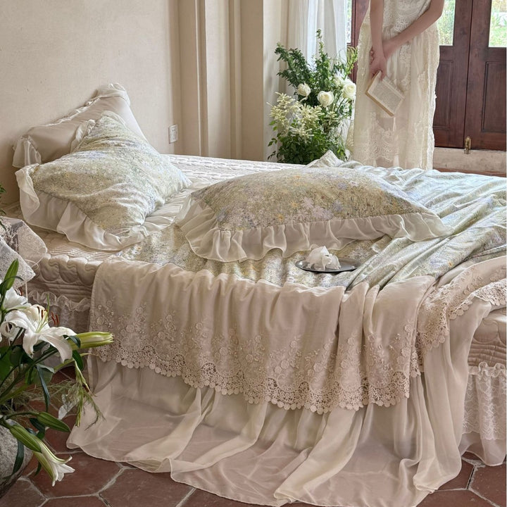 Romantic satin bedding set with ruffle and lace trimming
