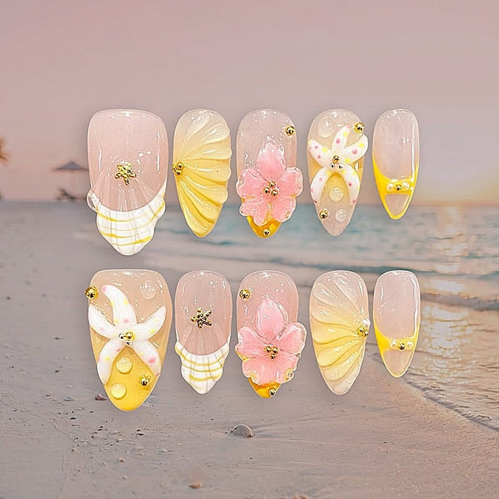 Artificial nail set with maritime motifs and colorful accents Bowlift