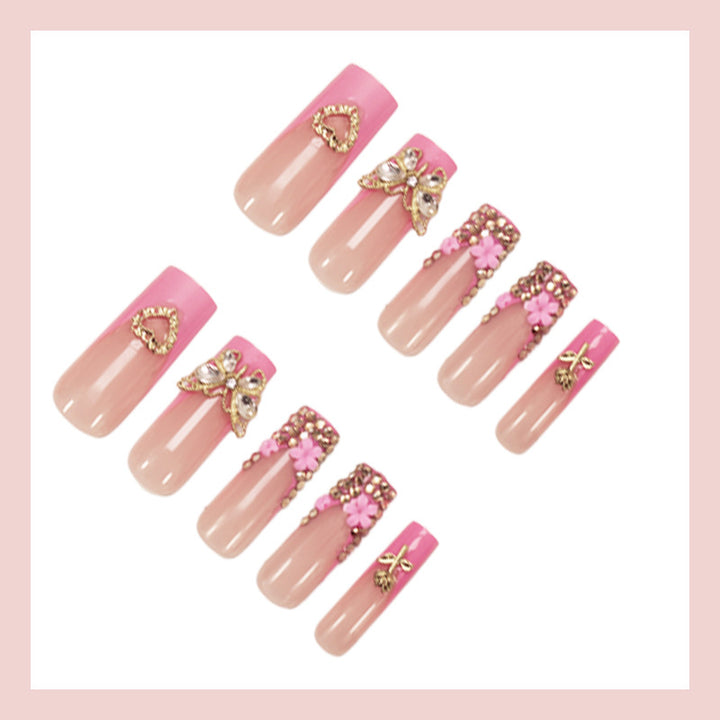 Artificial nail extension with glamorous embellishments Bowlift