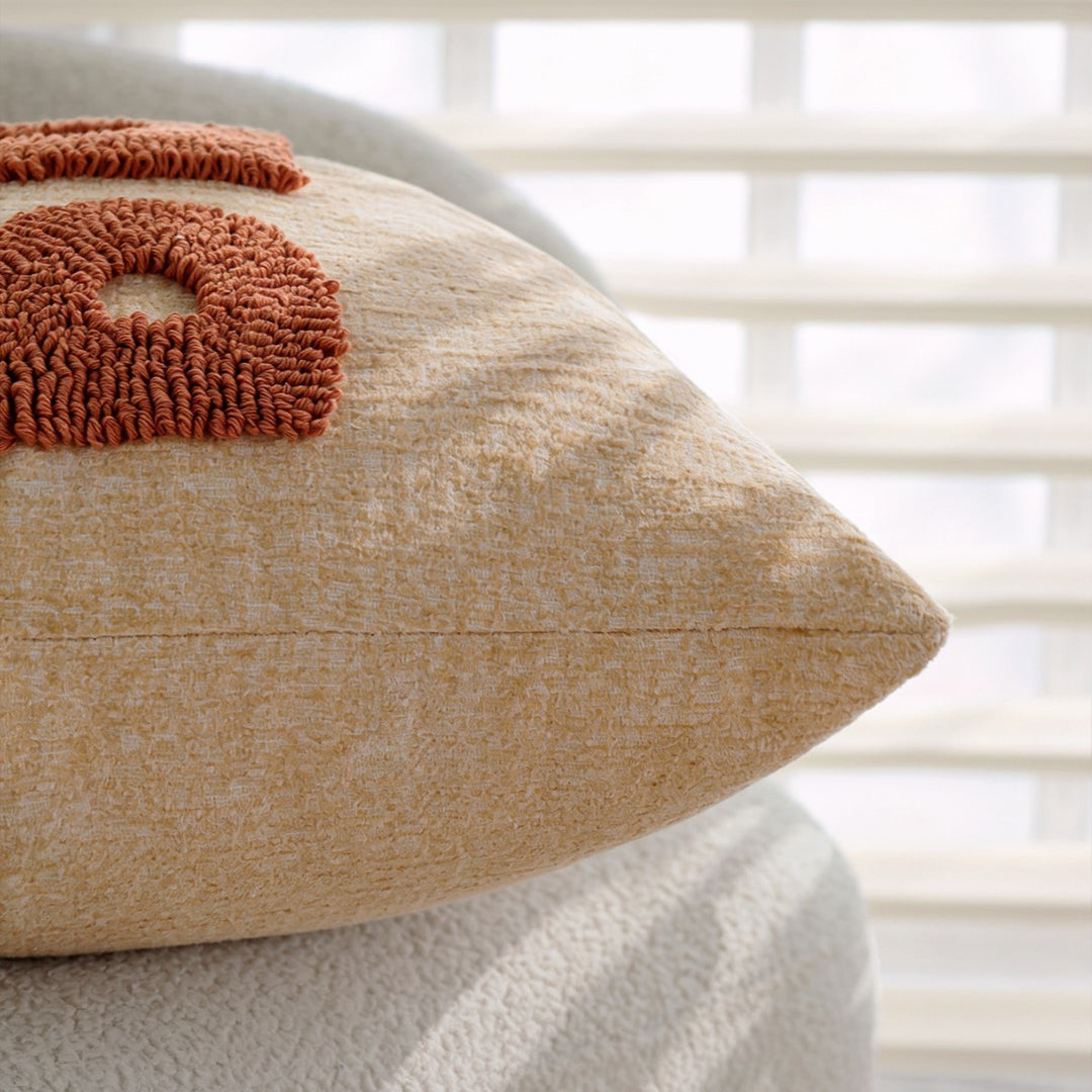 Decorative pillow with playful lettering