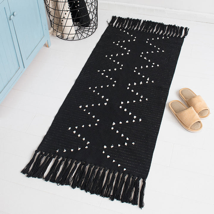Woven runner rug with fringes and graphic polka dot pattern Bowlift