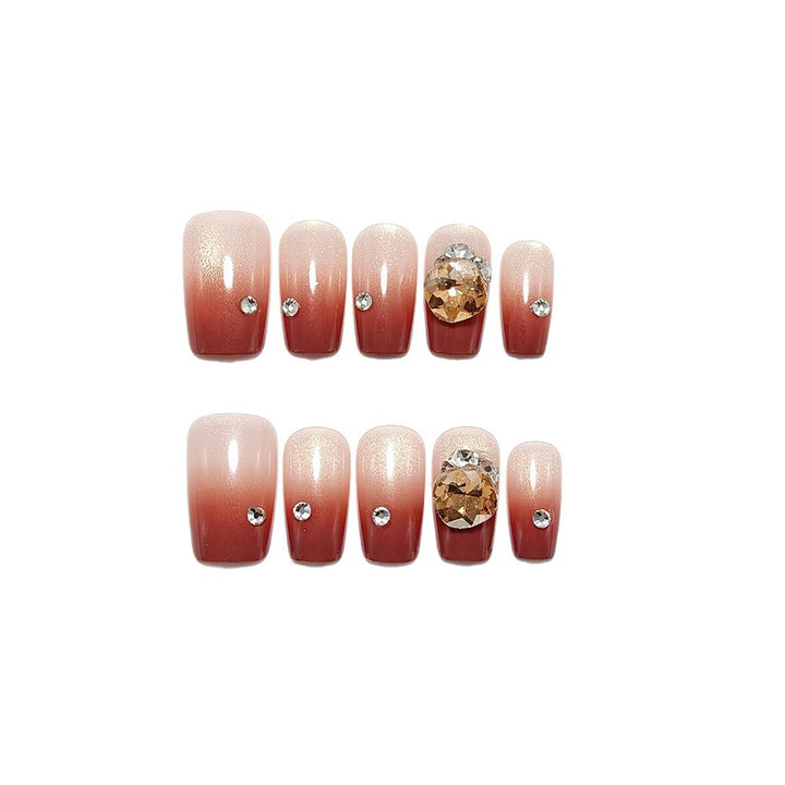 Artificial nail set with glittering rhinestone applications Bowlift