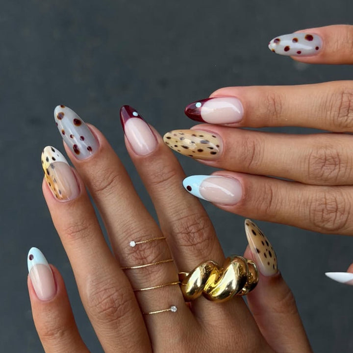 Artificial nail set with modern patterns and creative accents Bowlift