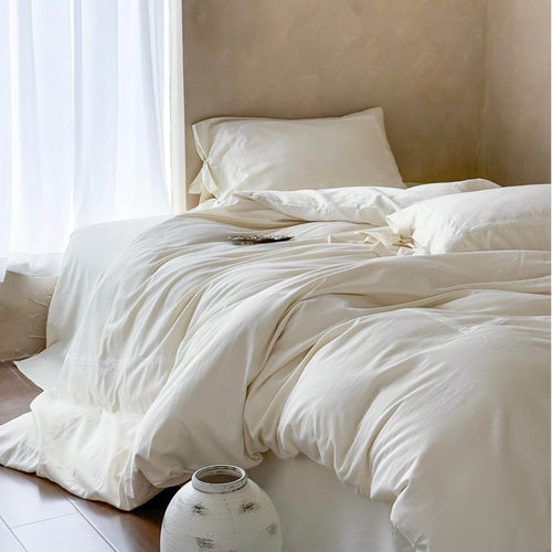 Ruffled bedding set made of cotton jacquard with medallion relief