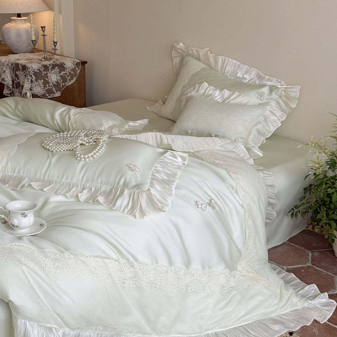 Luxurious satin bedding set with lace trim and ruffles