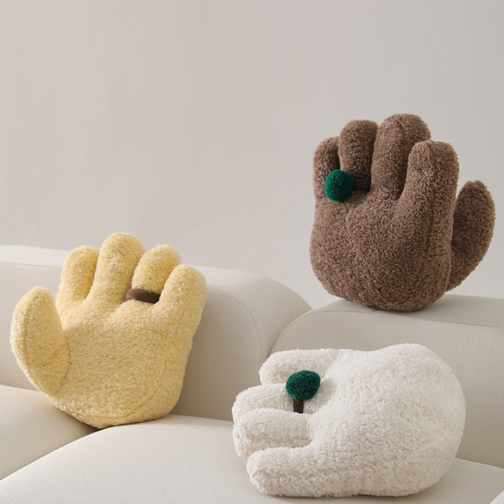 Cozy hand-shaped plush pillow with pompom ring