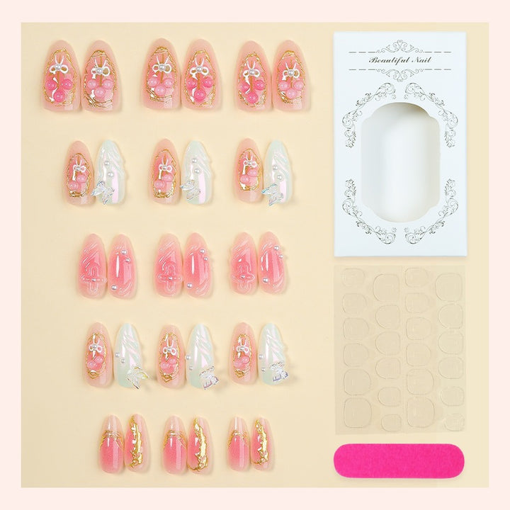 Acrylic nail set with stylish decorations and playful design Bowlift