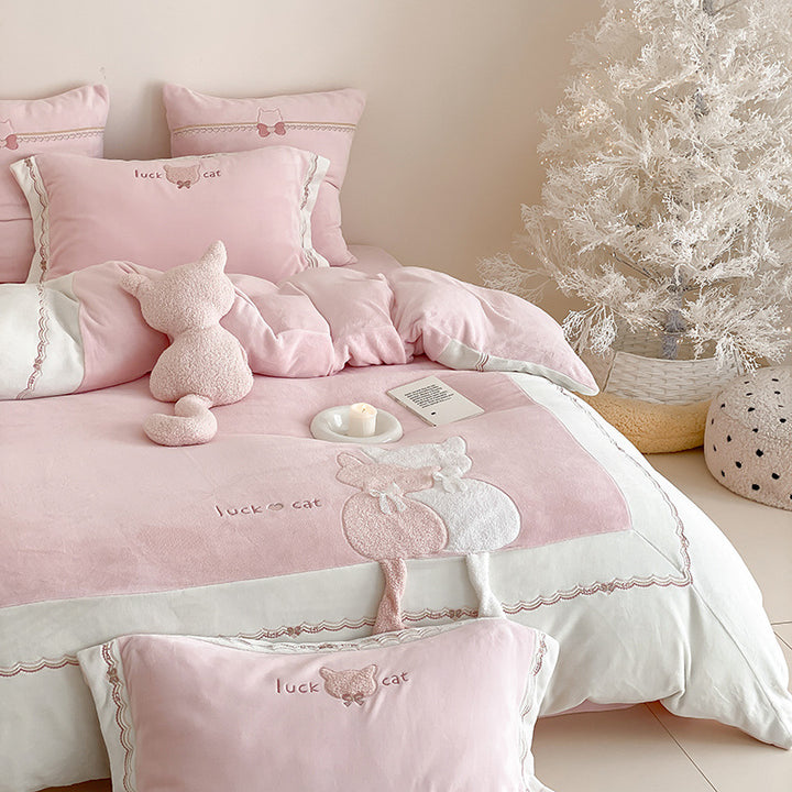 Bedding set with plush cat appliqué and embroidered design