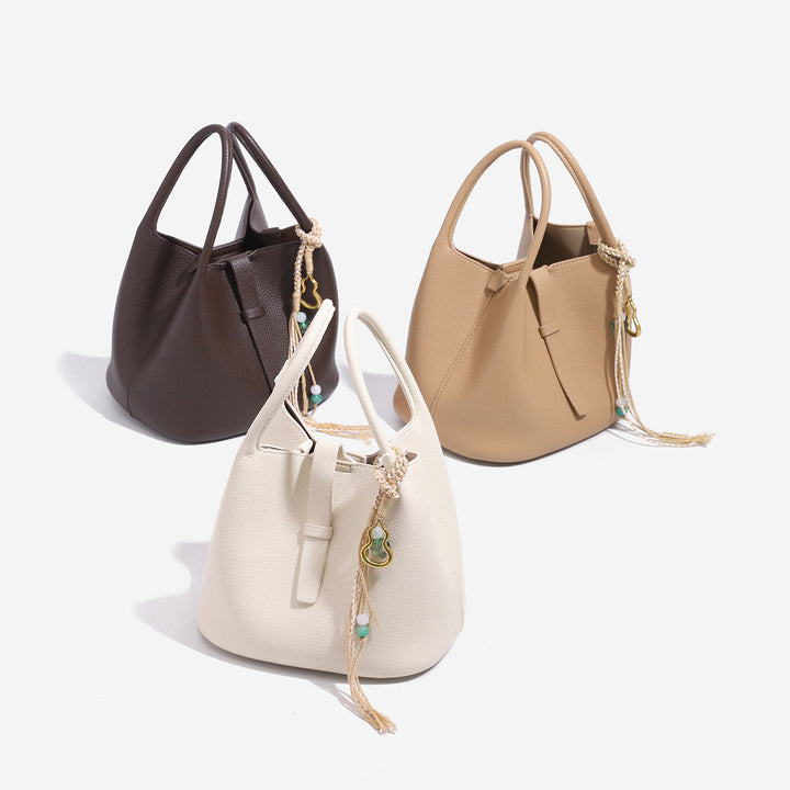 Stylish Bucket Handbag with Decorative Charm