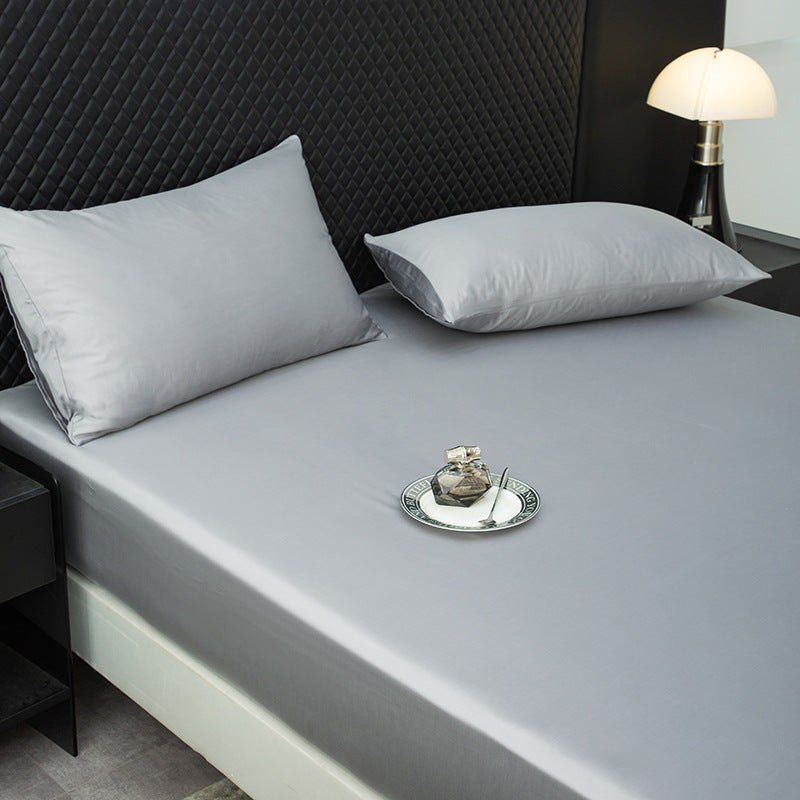 Fitted sheet and pillowcase set made of cotton satin with extra deep skirt and silky smooth surface