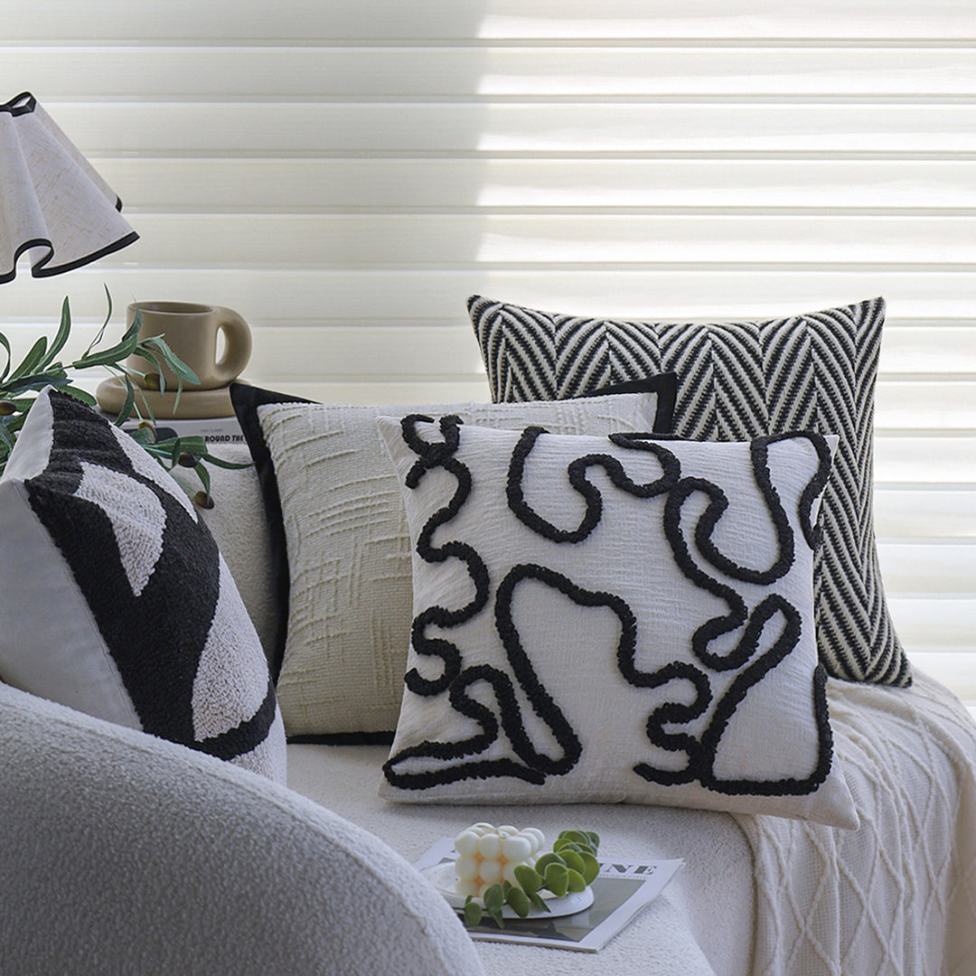 Square decorative cushion cover with geometric tufting and contrasting piping Bowlift