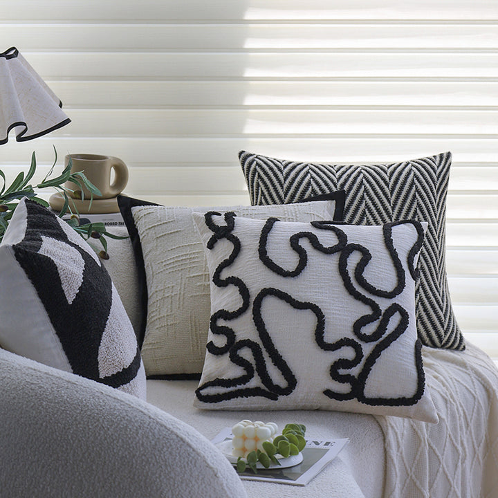 Square decorative cushion cover with geometric tufting and contrasting piping Bowlift