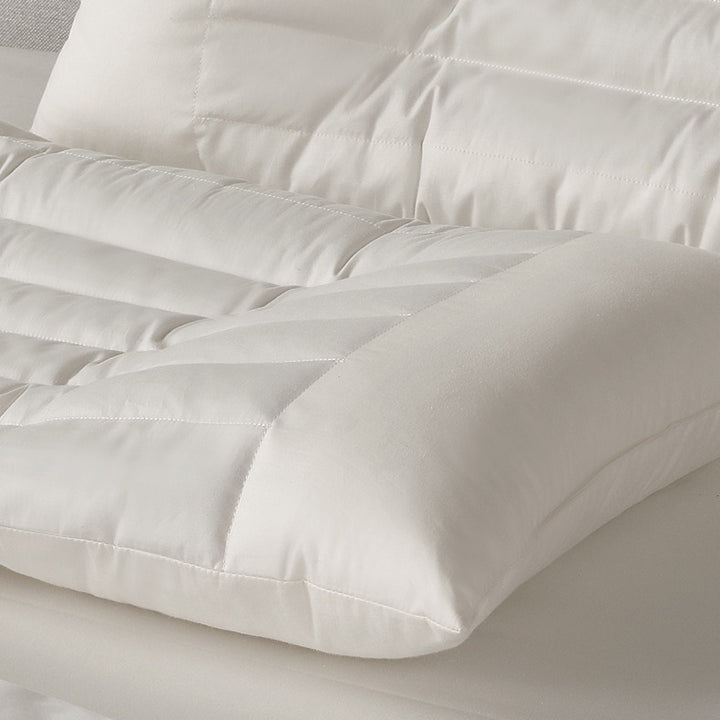 Ergonomic neck and side sleeper pillow with supportive contour