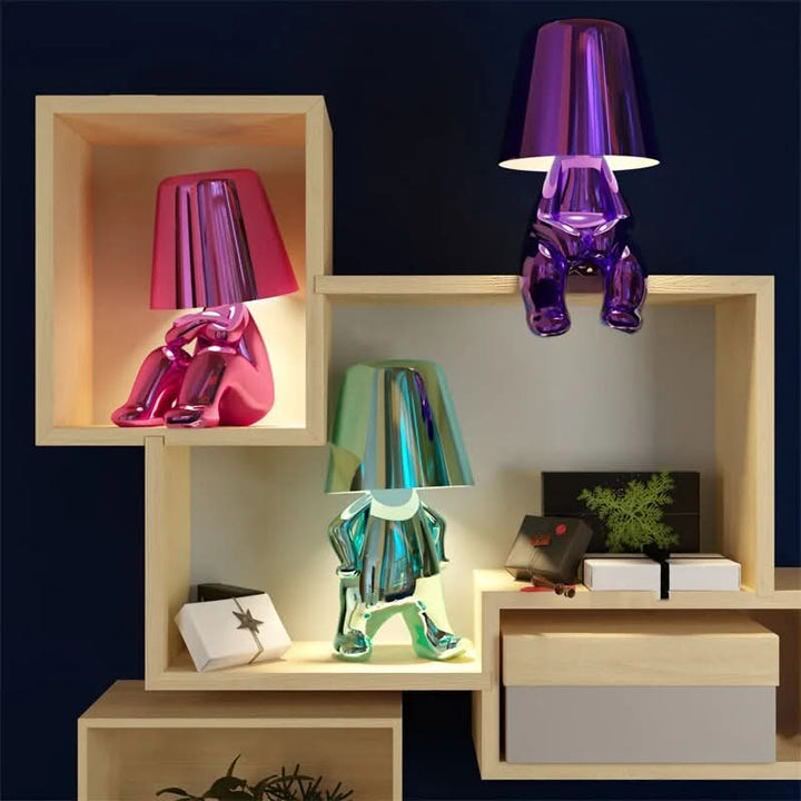 BowLift | Goldie Resin Thinker LED Table Lamp