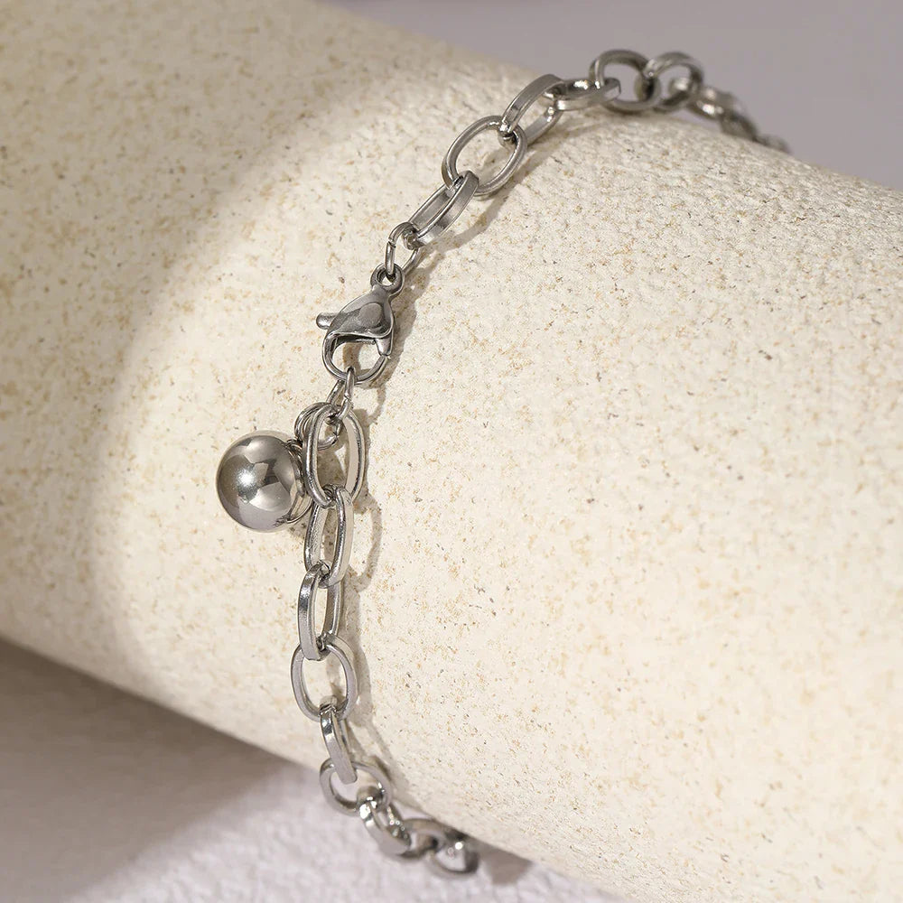 BowLift | Chunky Paperclip Tassel Ball Bracelet