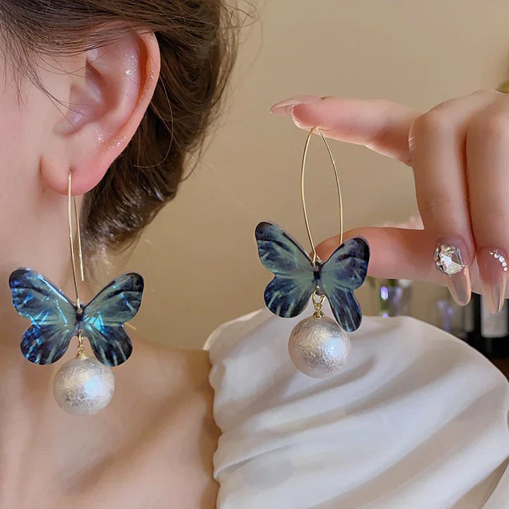 BowLift | Black Hollow Butterfly Dangle Earrings