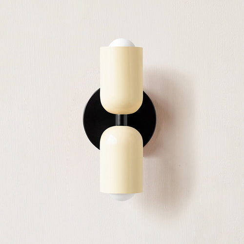 BowLift | Lively, minimalist wall lamp with two light bulbs