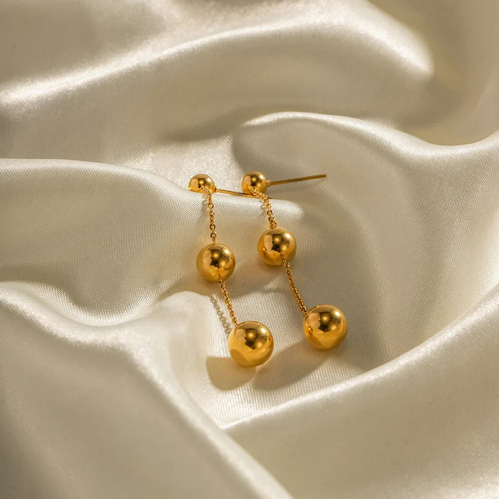 BowLift | Dangle Gold Bead Tassel Earrings