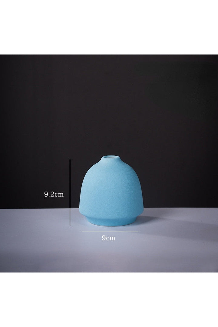 pastel-colored vases | Bowlift