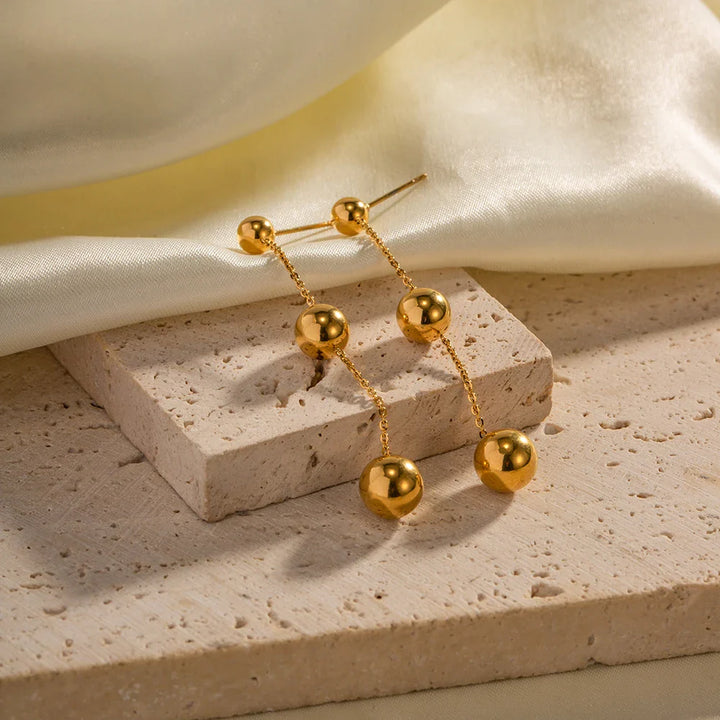 BowLift | Dangle Gold Bead Tassel Earrings