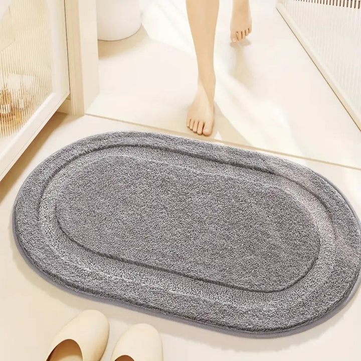 BowLift | Snug Step Oval Bath Mat