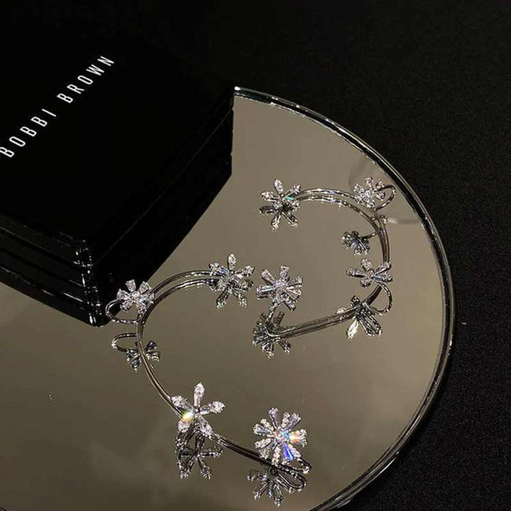 BowLift | Spinning Snowflake Earrings