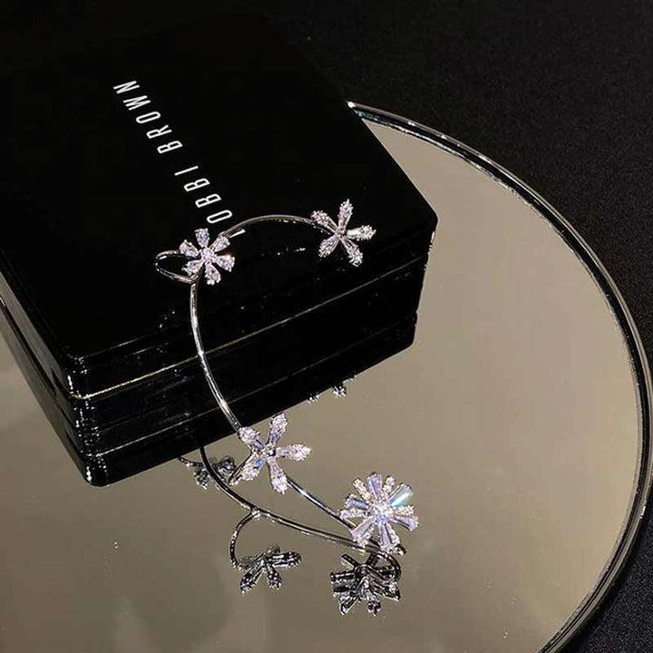 BowLift | Spinning Snowflake Earrings
