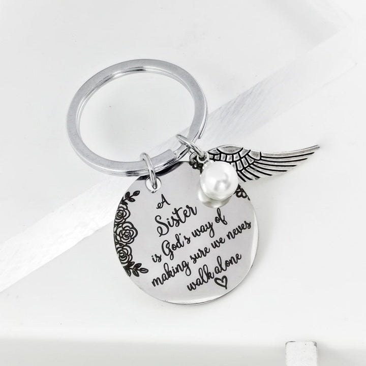 BowLift | A sister is God's way of making sure we never walk alone keychain