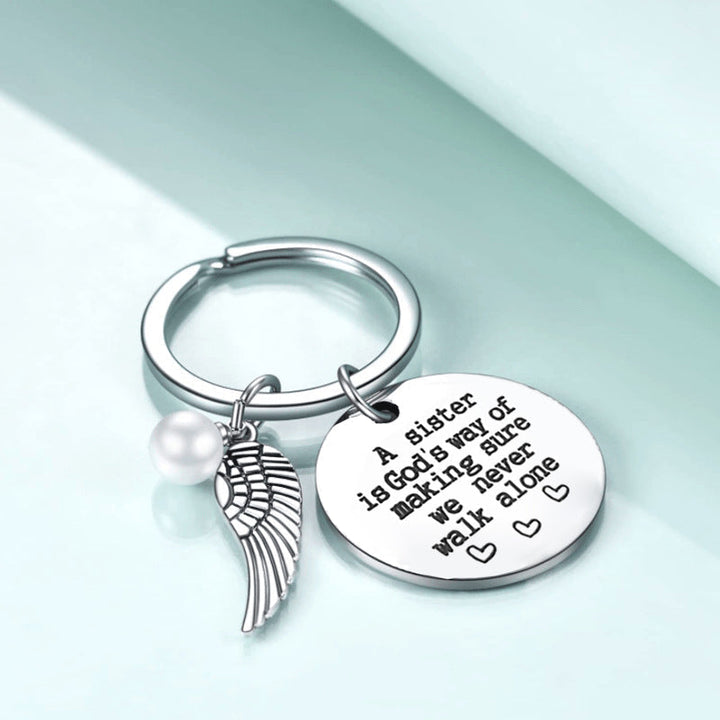 BowLift | A sister is God's way of making sure we never walk alone keychain