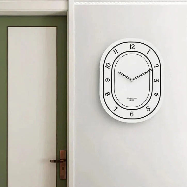 BowLift | Silent Oval Wall Clock with Roman Numerals Design
