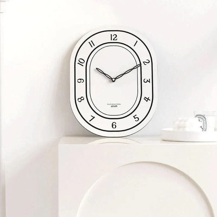 BowLift | Silent Oval Wall Clock with Roman Numerals Design